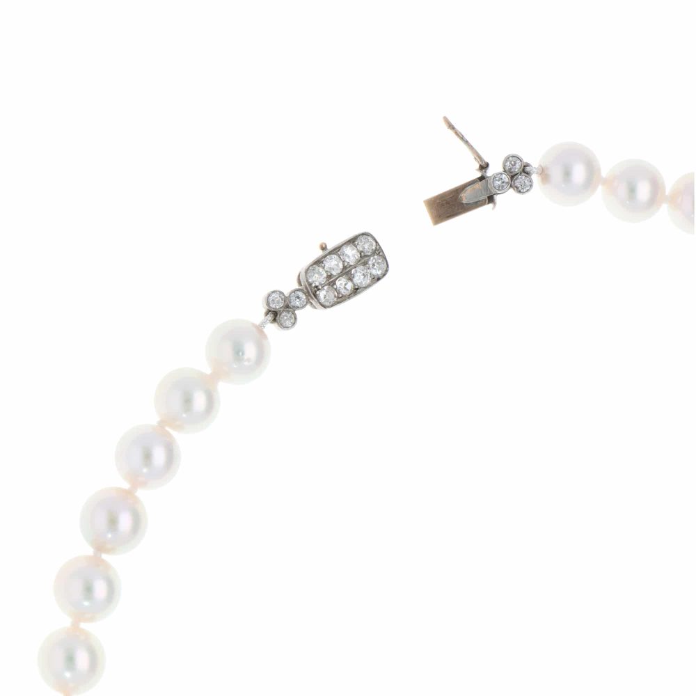 Akoya pearl necklace with a vintage Art Deco diamond clasp.