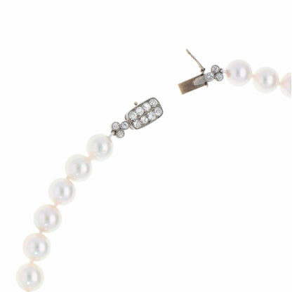 Akoya pearl necklace with a vintage Art Deco diamond clasp.