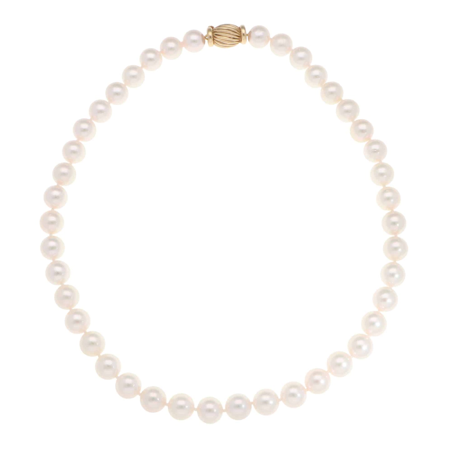 Akoya pearl necklace with a vintage ridged barrel clasp in gold.
