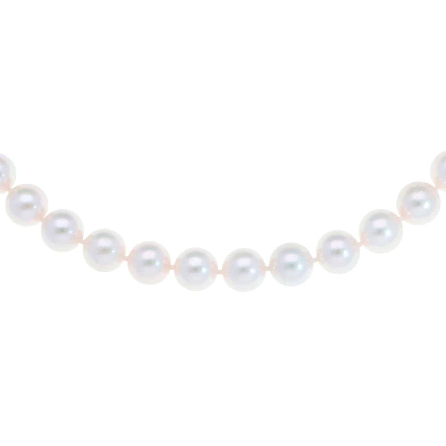 Akoya pearl necklace with a vintage ridged barrel clasp in gold.