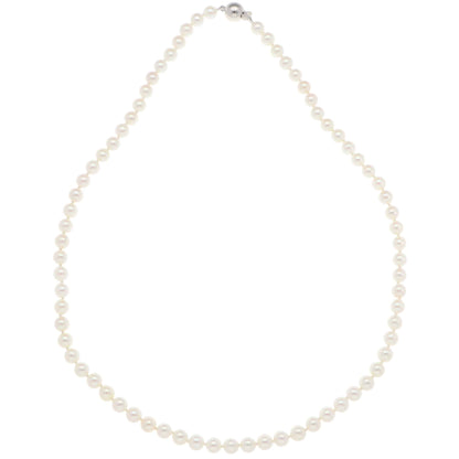A white pearl single row necklace with a white gold clasp, on a white background