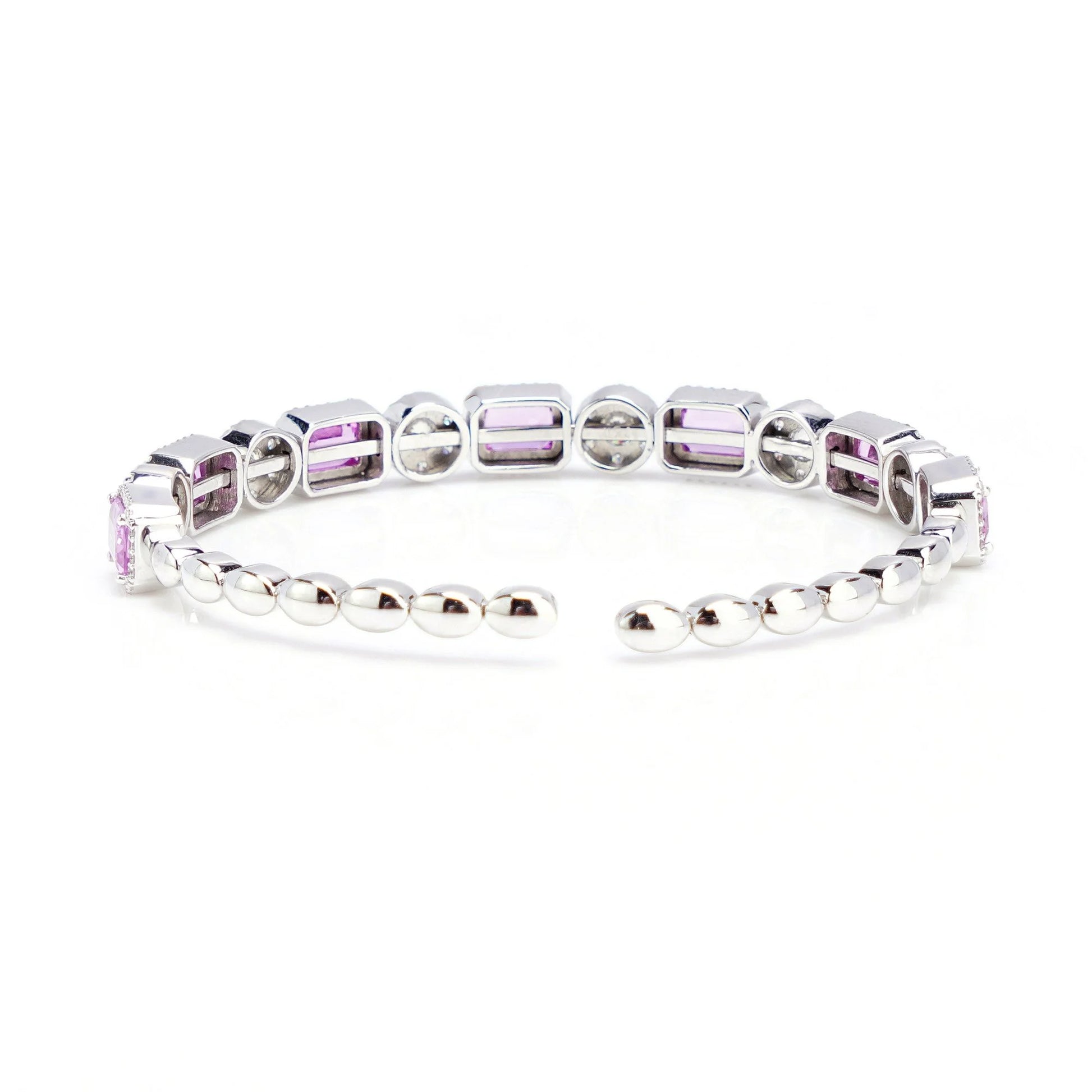 18 Carat White Gold Bangle With Natural Pink Sapphires And Diamonds