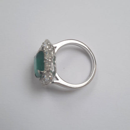 4ct Zambian Octagonal Emerald and Diamond Cluster Ring