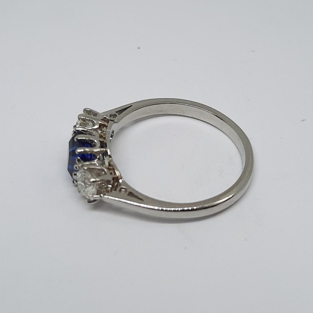 1.23ct Sapphire and Old Cut Diamond Three Stone Ring