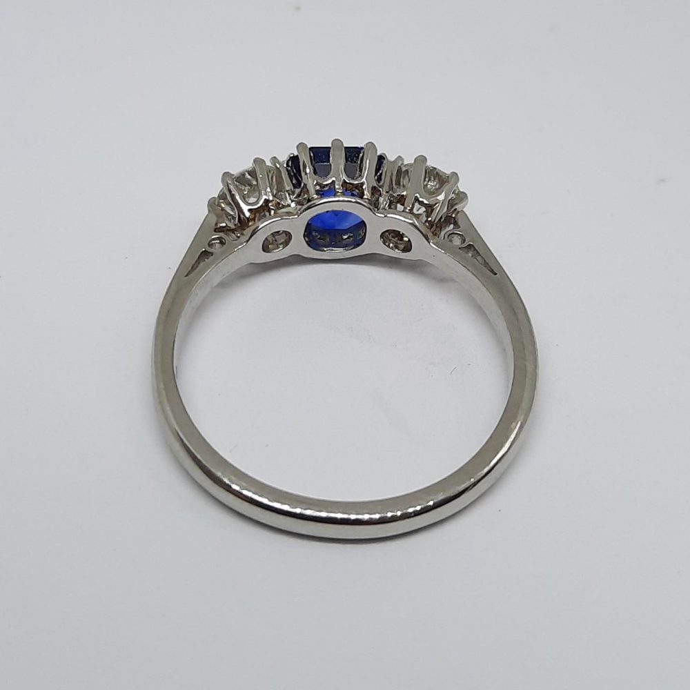 1.23ct Sapphire and Old Cut Diamond Three Stone Ring