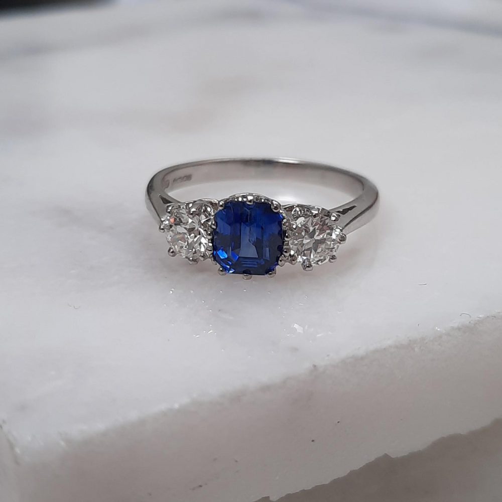 1.23ct Sapphire and Old Cut Diamond Three Stone Ring
