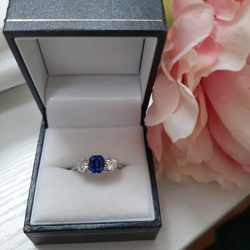 1.23ct Sapphire and Old Cut Diamond Three Stone Ring