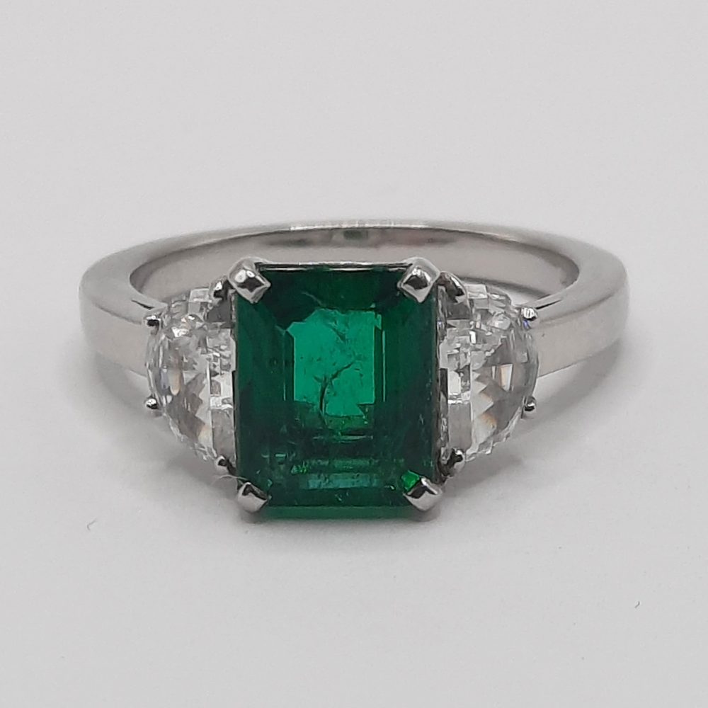 2ct Emerald and Half Moon Diamond Platinum Ring