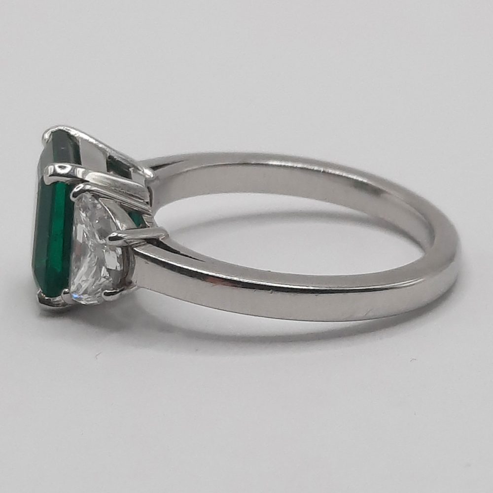 2ct Emerald and Half Moon Diamond Platinum Ring