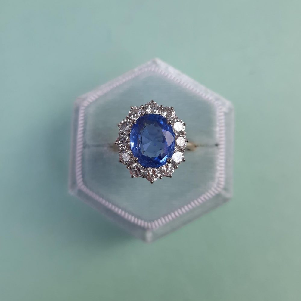 4ct Oval Sapphire and Diamond Cluster Ring