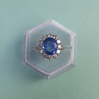 4ct Oval Sapphire and Diamond Cluster Ring