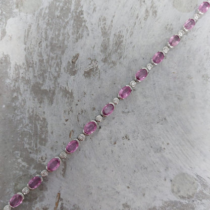 Pink sapphire and diamond tennis bracelet