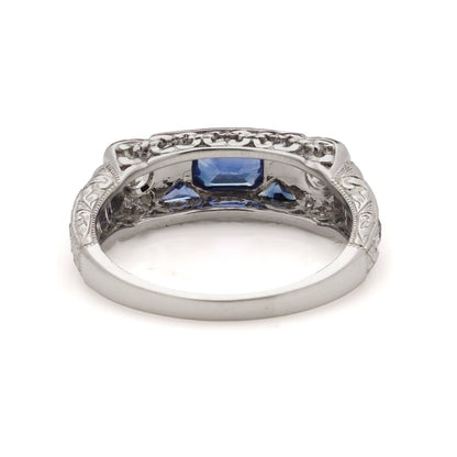0.63ct Emerald Cut Sapphire and Diamond Three Stone Trilogy Ring in Platinum
