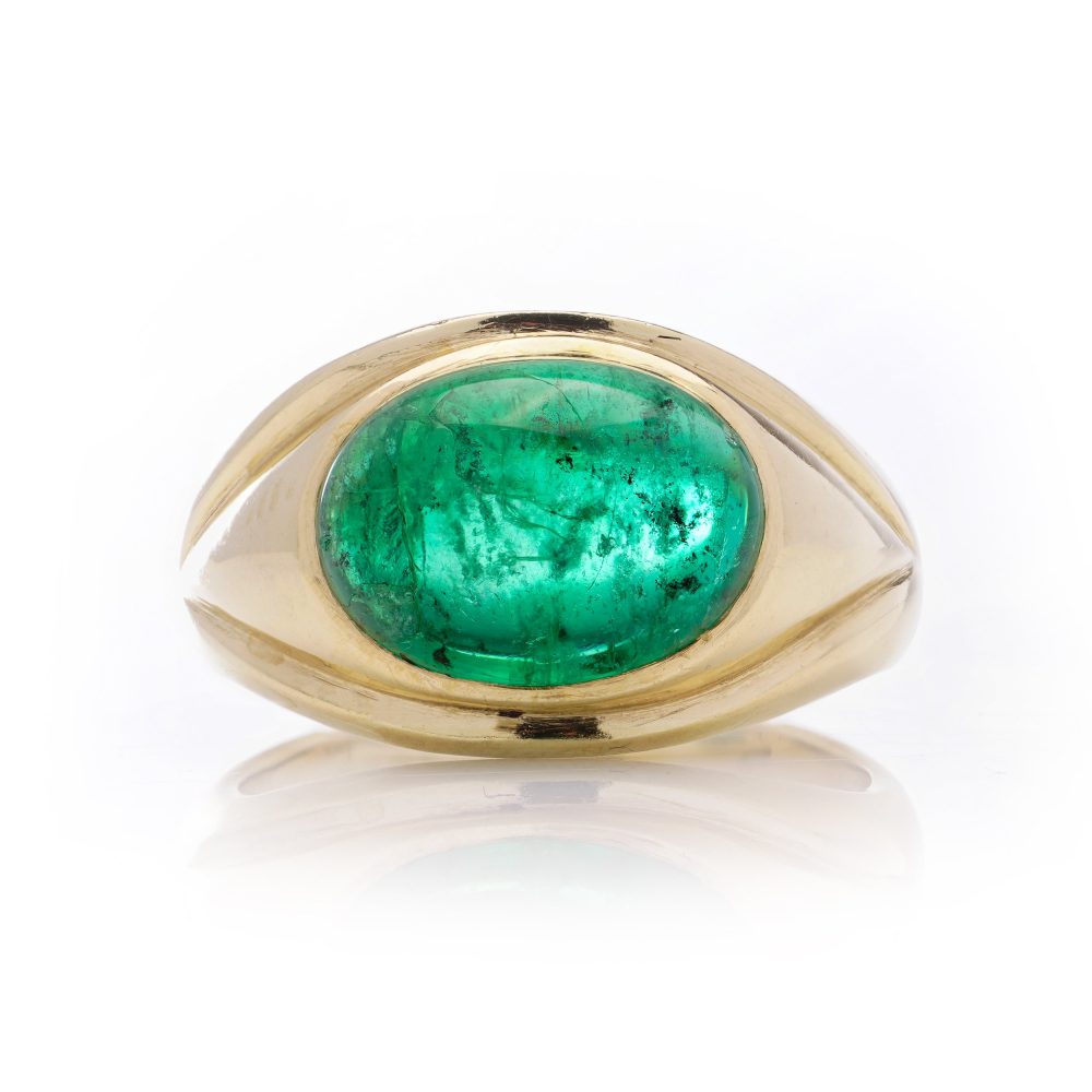 Vintage emerald dome ring set in gold.