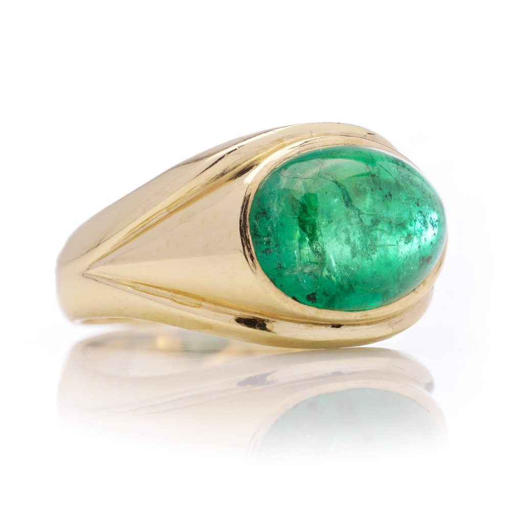 Vintage emerald dome ring set in gold.