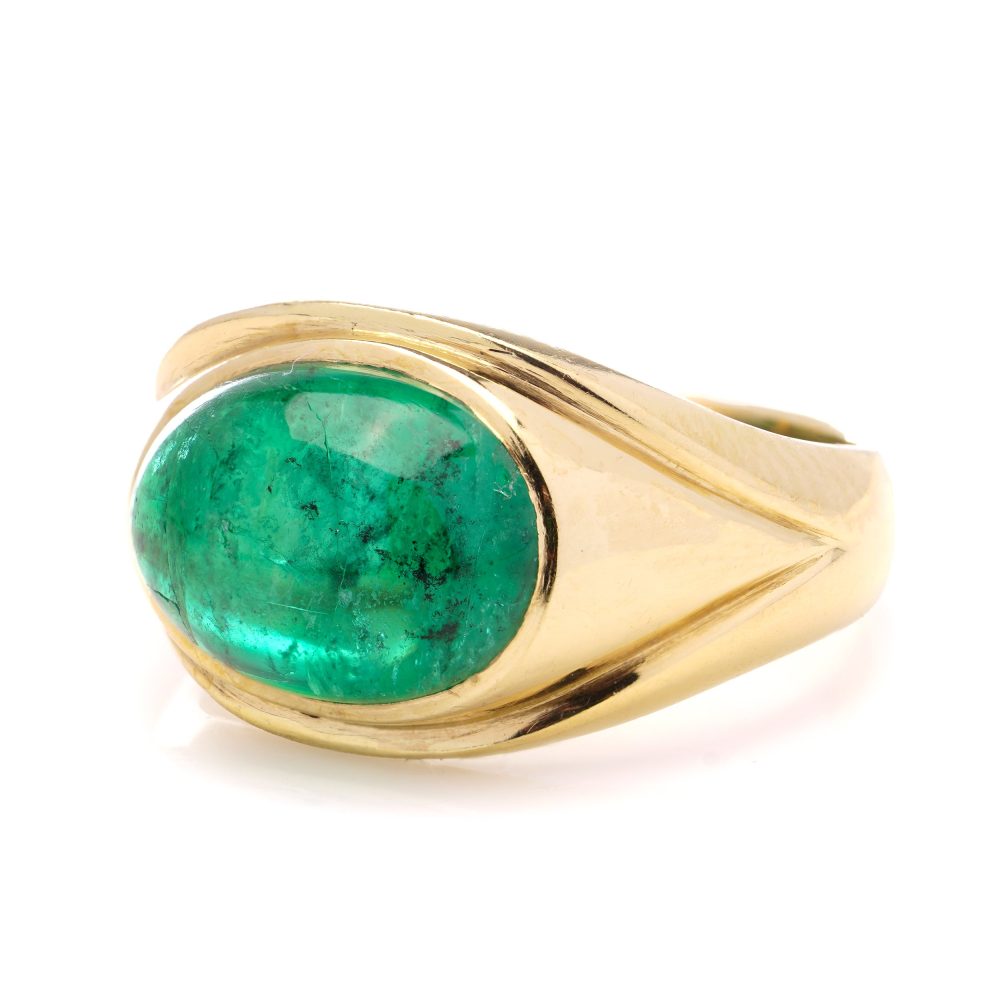 Vintage emerald dome ring set in gold.