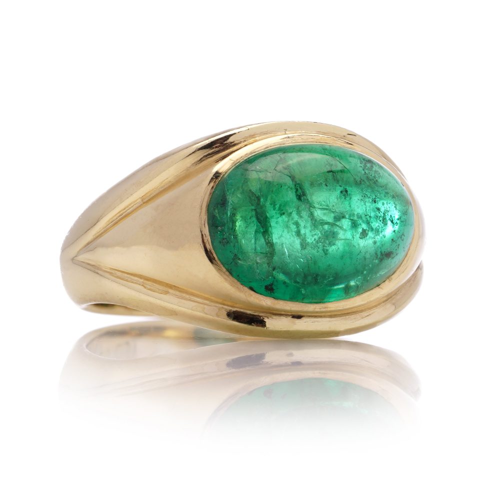 Vintage emerald dome ring set in gold.