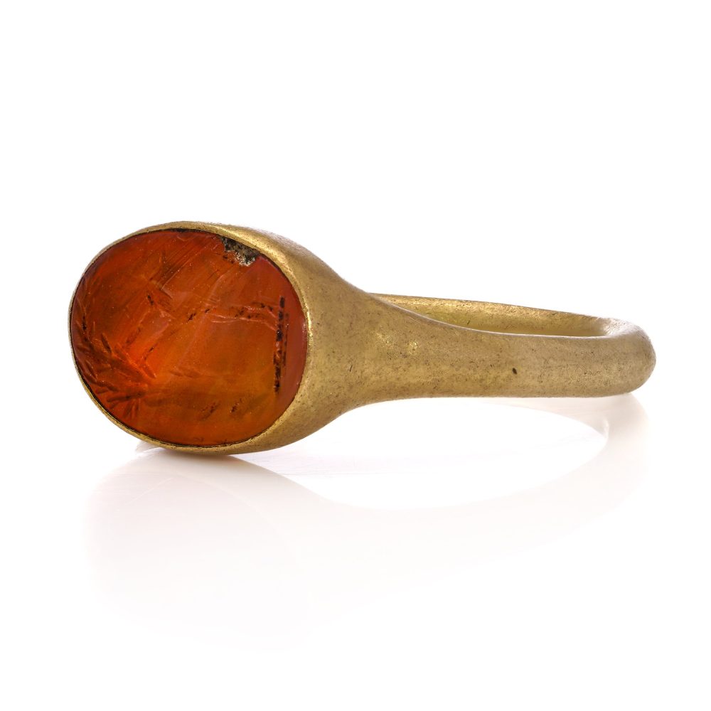 Roman carnelian intaglio ring set in 22 ct yellow gold, circa 100 - 300 AD.