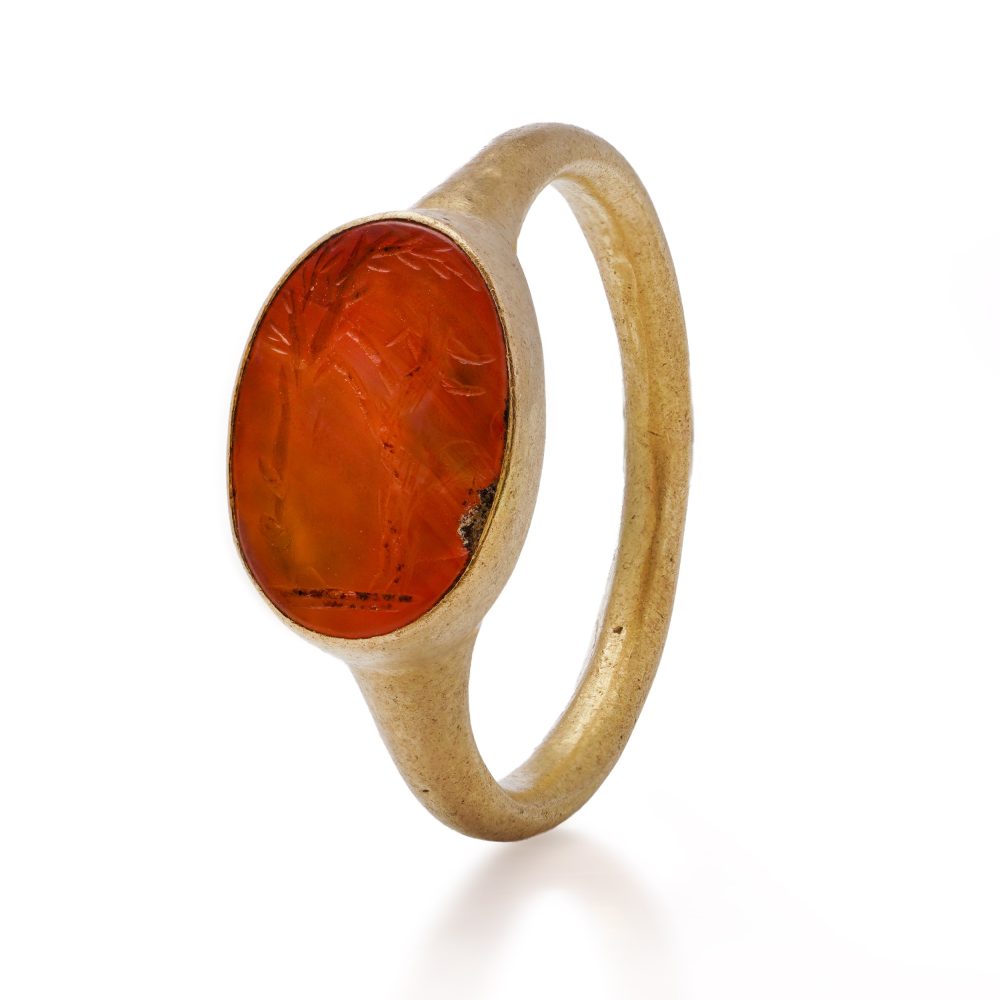 Roman carnelian intaglio ring set in 22 ct yellow gold, circa 100 - 300 AD.