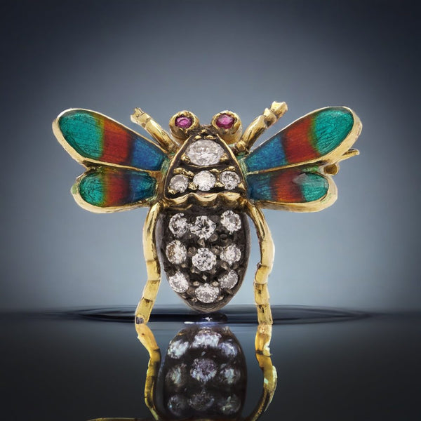 Antique insect brooch in gold and silver set with diamonds enamel and rubies. 