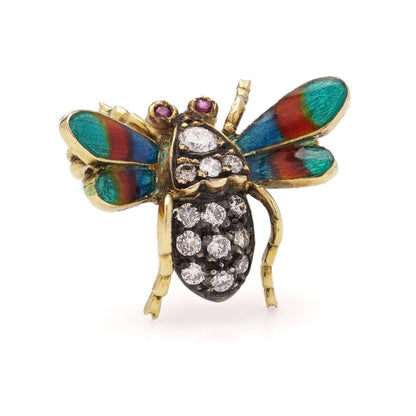 Antique insect brooch in gold and silver set with diamonds enamel and rubies. 