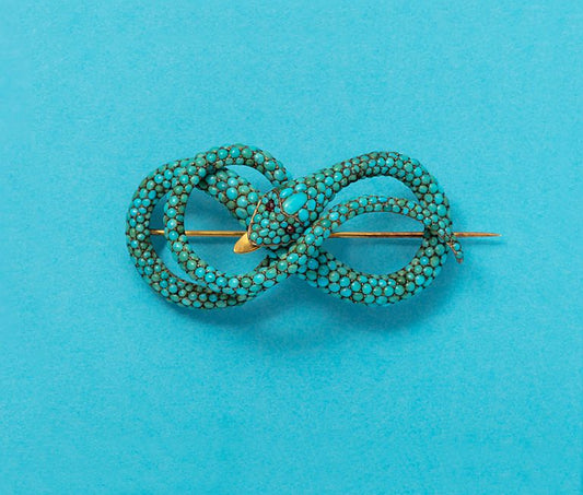 An antique Georgian gold and turquoise snake brooch