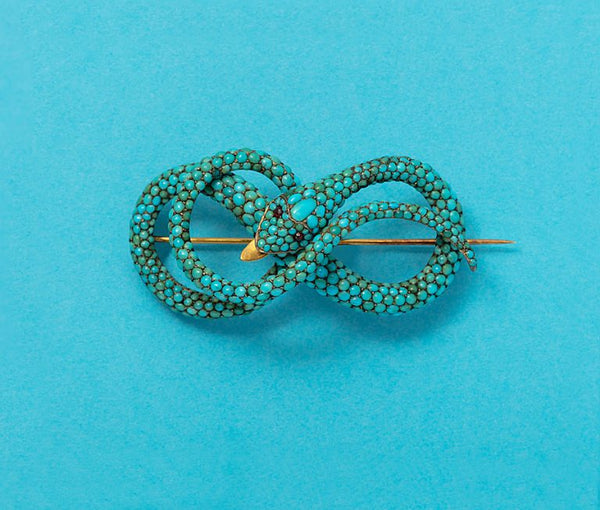 An antique Georgian gold and turquoise snake brooch