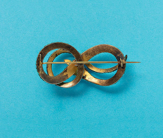 An antique Georgian gold and turquoise snake brooch