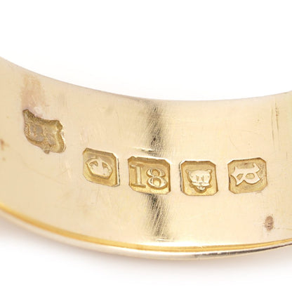 Antique gold men's snake band ring with diamonds.