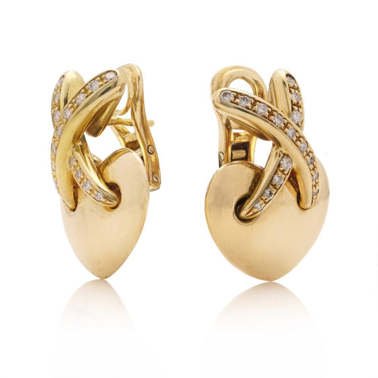Chaumet gold heart-shaped clip earrings with X design set with diamonds.