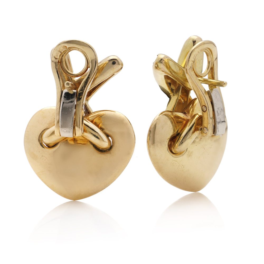 Chaumet gold heart-shaped clip earrings with X design set with diamonds.
