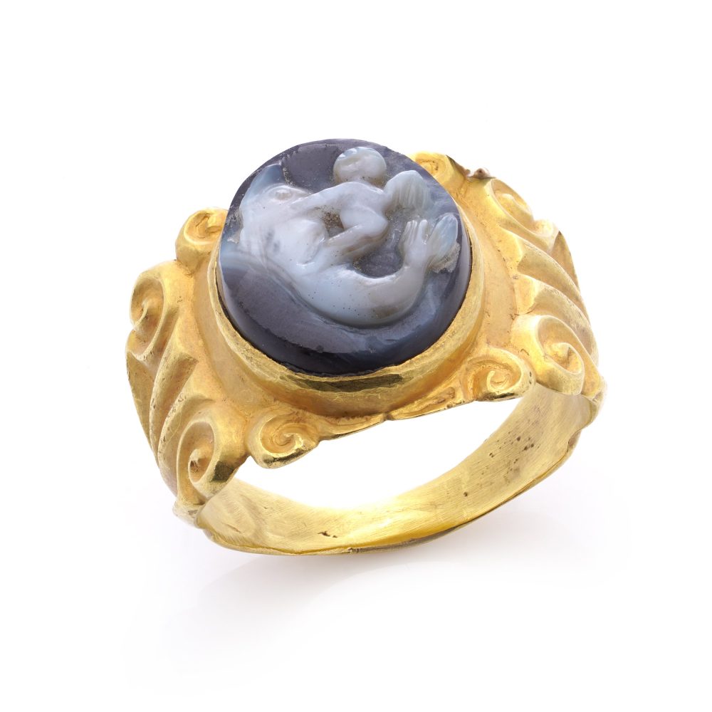 Antique Chalcedony Cameo and 22ct Yellow Gold Ring featuring Eros Cupid riding a dolphin. 19th century Circa 1890s