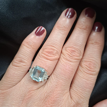 2.98ct Emerald Cut Aquamarine Ring with Princess Cut Diamond Shoulders