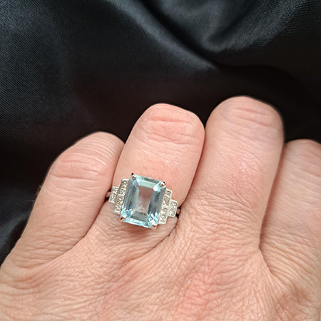 2.98ct Emerald Cut Aquamarine Ring with Princess Cut Diamond Shoulders