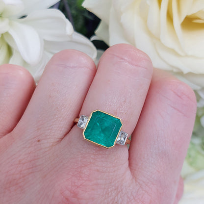 Octagonal Cut Emerald and Diamond Three Stone Ring