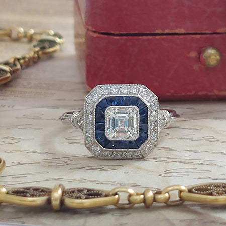 0.55ct Asscher Cut Diamond and Sapphire Target Cluster Engagement Ring in Platinum