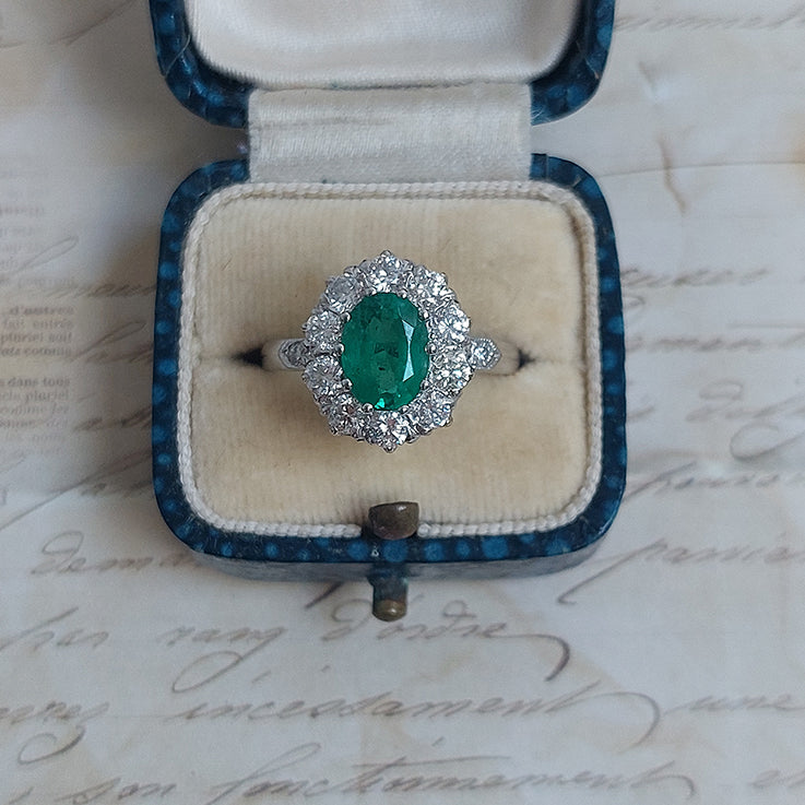 1.31ct Oval Emerald and Diamond Cluster Engagement Ring in Platinum
