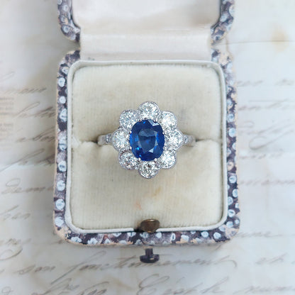 1.90ct Oval Sapphire and Diamond Cluster Engagement Ring in Platinum