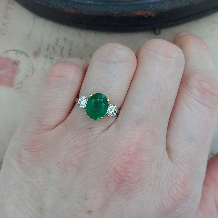 2.44ct Oval Emerald and Diamond Three Stone Engagement Ring