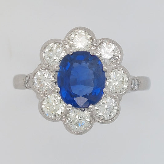 1.90ct Oval Sapphire and Diamond Cluster Engagement Ring in Platinum