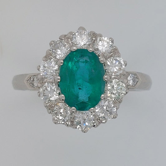 1.31ct Oval Emerald and Diamond Cluster Engagement Ring in Platinum