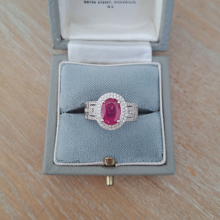 2.54ct Burma Ruby and Double Diamond Cluster Dress Ring on 18ct white gold openwork geometric band studded with sparkling diamonds