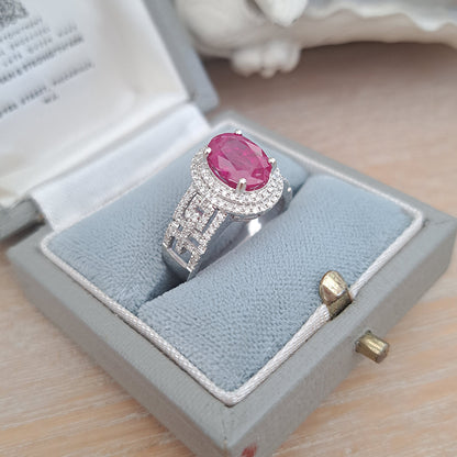 2.54ct Burma Ruby and Double Diamond Cluster Dress Ring on 18ct white gold openwork geometric band studded with sparkling diamonds