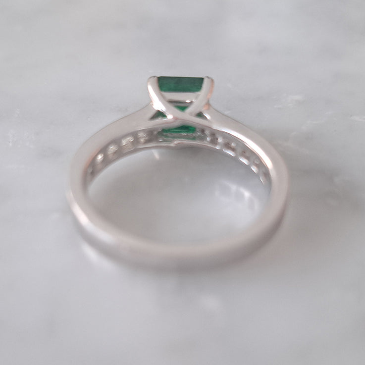 1.15ct Princess Cut Colombian Emerald Solitaire Ring with Princess Cut Diamond Shoulders in 18ct white gold