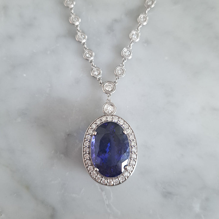 Fine 18.41ct Oval Tanzanite and Diamond Cluster Pendant Necklace on Diamond Set Chain