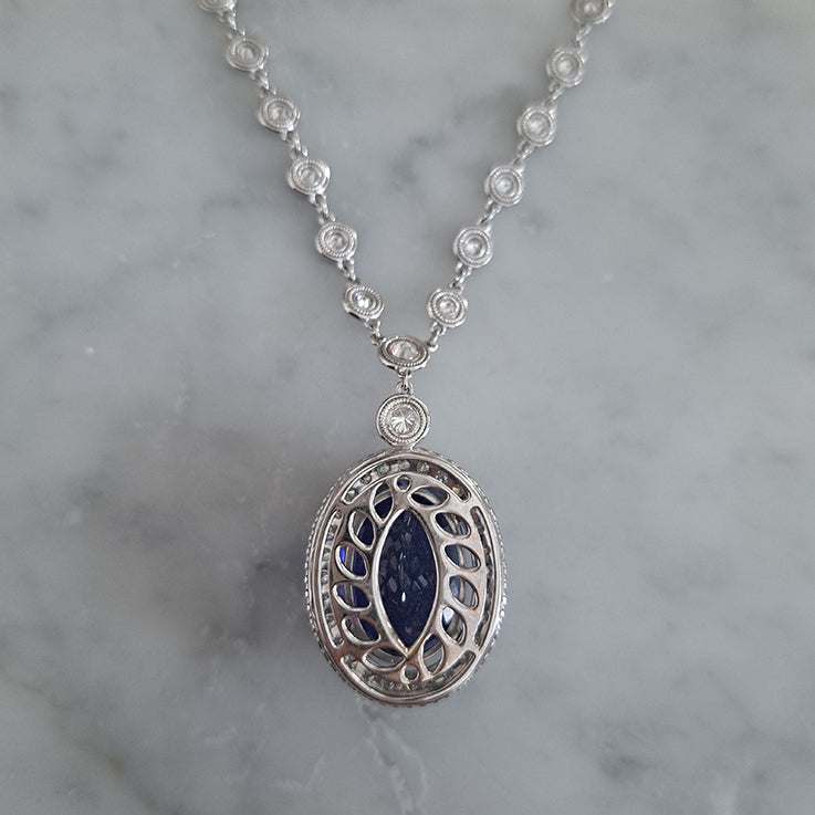 Fine 18.41ct Oval Tanzanite and Diamond Cluster Pendant Necklace on Diamond Set Chain