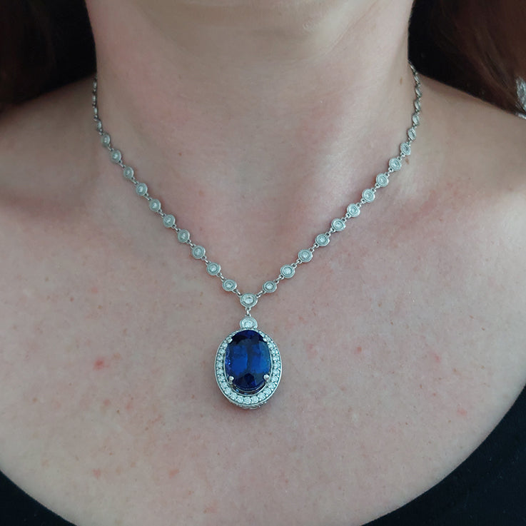 Fine 18.41ct Oval Tanzanite and Diamond Cluster Pendant Necklace on Diamond Set Chain