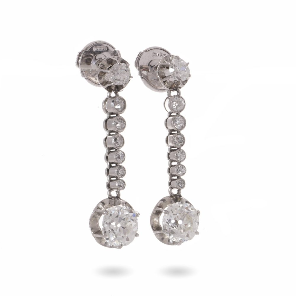 Antique diamond drop earrings set in platinum.