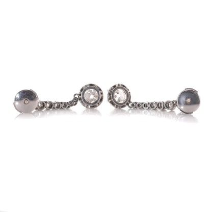 Antique diamond drop earrings set in platinum.