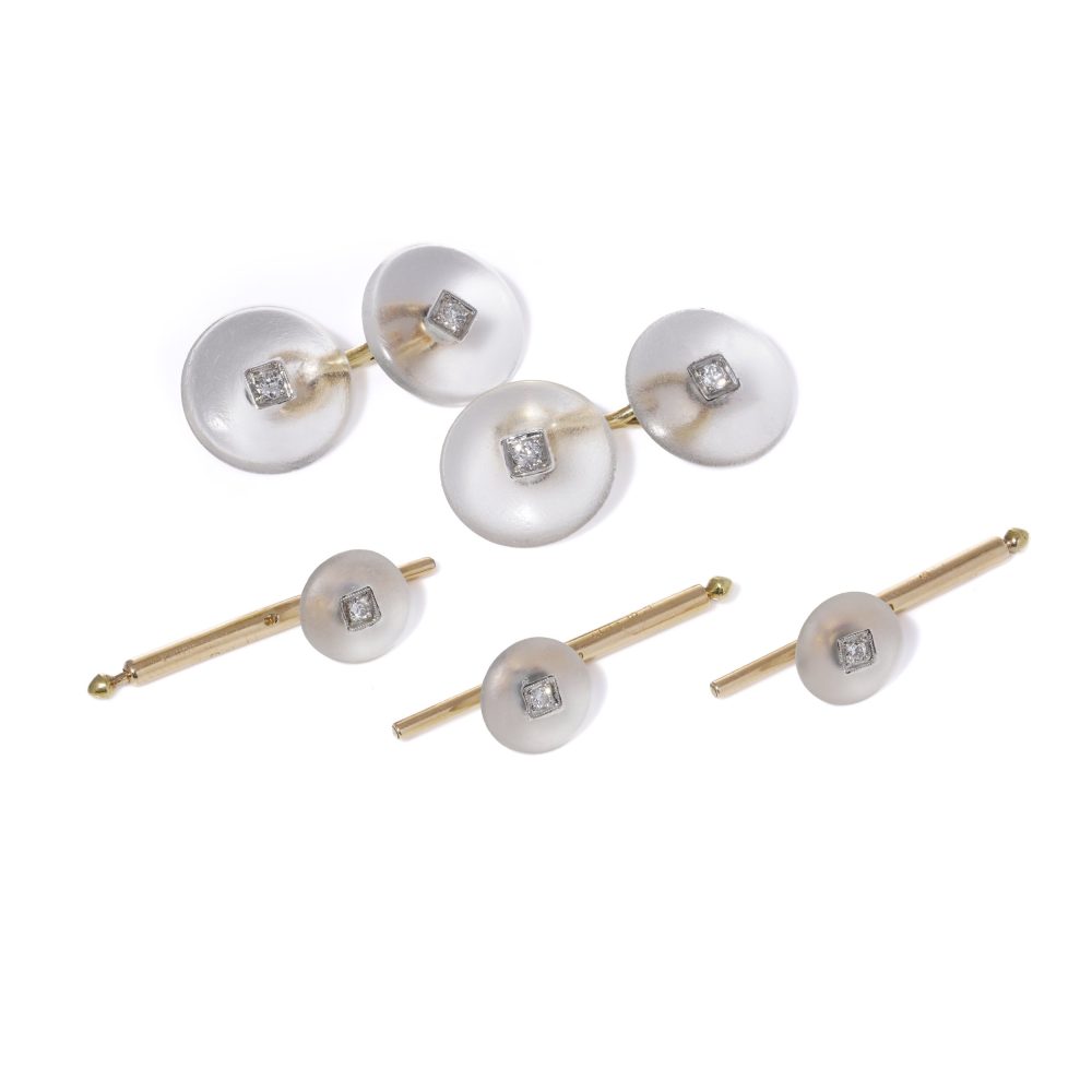 Cartier cufflinks and shirt studs in gold and platinum with rock crystals and diamonds.